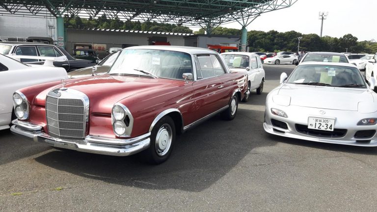 JDM Co., Ltd checking cars at Vintage and Classic cars corner. USS Tokyo Japan Used Car Auction